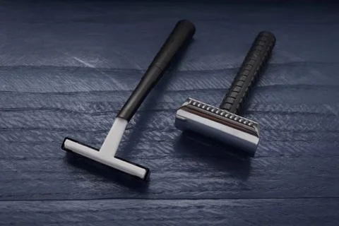 Two black blade on a dark background 写真素材