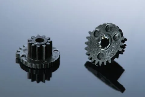 Two black cogwheels Stock Photos