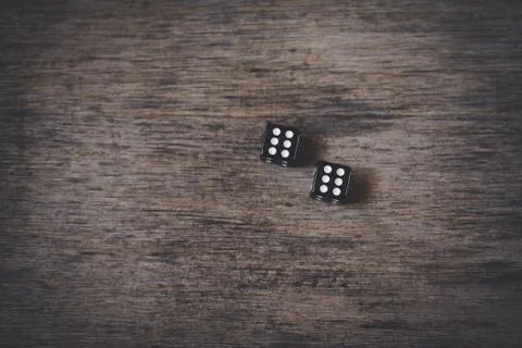 Two black dice Stock Photos