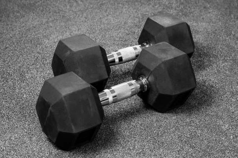 Two black dumbbells Stock Photos