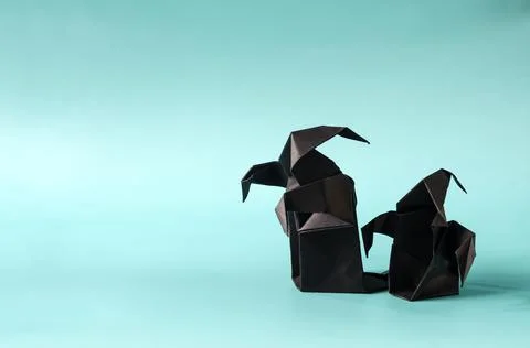 Two black ghosts on the blue background of the mine space. Stock Photos