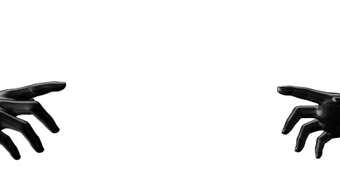 Two black human hands reaching out to each other Stock Footage 180991855