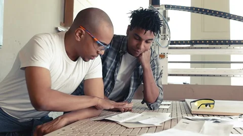 Two black man factory workers Stock Footage 155357838