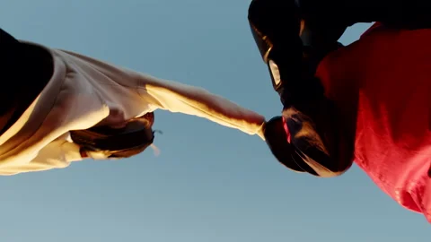Two black men training boxing against background sunset outdoors, bottom view Stock Footage 171173128
