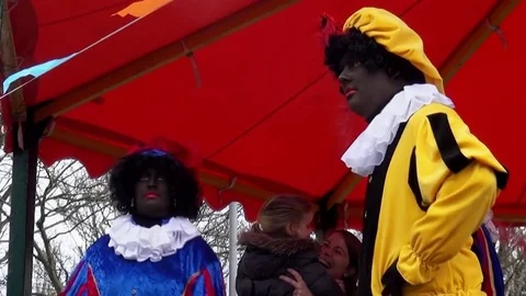 Two Black Pieten dancing Stock Footage 82387668