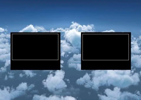 Two black rectangles with white frames and copy space over blue sky with clouds Stock Photos
