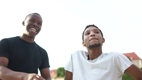 Two black students are having fun. Urban close-up outdoor portrait. Happy people Stock Footage 137113762
