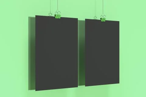 Two blank black posters with binder clip mockup on green background Stock Illustration
