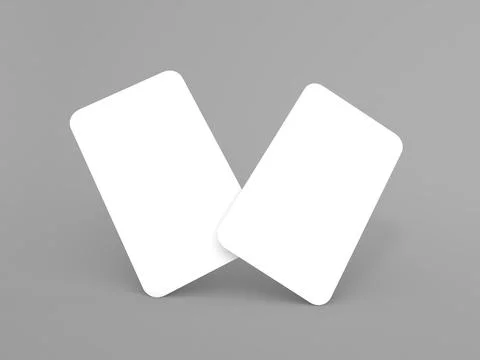 Two blank cards placed at an angle on a gray surface during daylight Stock Illustration