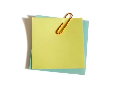 Two blank notes with a colored clip Stock Photos