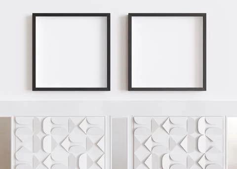 Two blank square picture frames hanging on white wall. Template, mock up for 스톡 일러스트