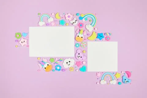 Two blank white cards on pastel purple background with kawaii cartoon animals Stock Photos