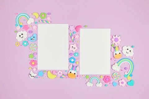 Two blank white cards on pastel purple background with kawaii cartoon animals Stock Photos