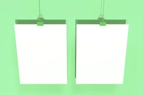 Two blank white posters with binder clip mockup on green background Stock Illustration