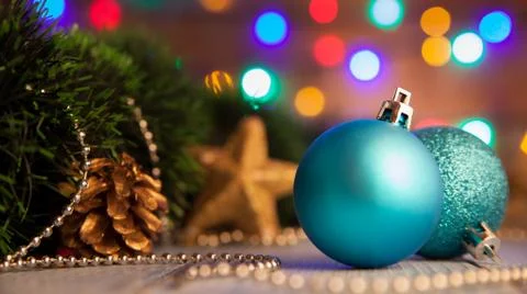 Two blue balls on a table in the background of a bokeh Stock Photos
