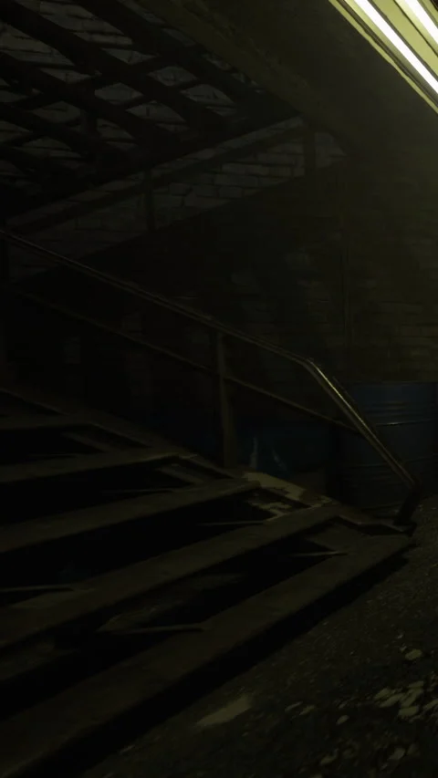 Two blue barrels sit in a dark corner of a warehouse space at night Stock Footage 339949382