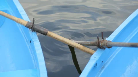 Two blue boats on a lake  Stock Footage 62778760