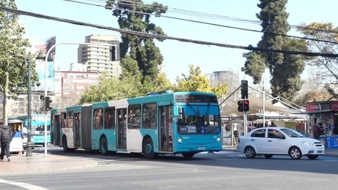 Two blue buses pass Stock Footage 96588675
