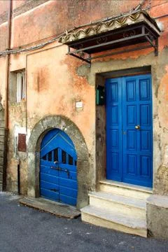 Two blue doors Stock Photos