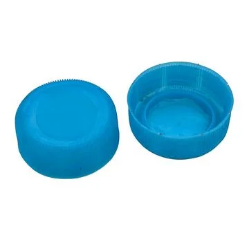 Two Blue Plastic Bottle Caps 스톡 사진