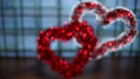 Two blurred figures in the form of a heart on a blue background. Stock Footage 168963002