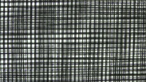 Two blurred repeating metal meshes. Stock Footage 150485945