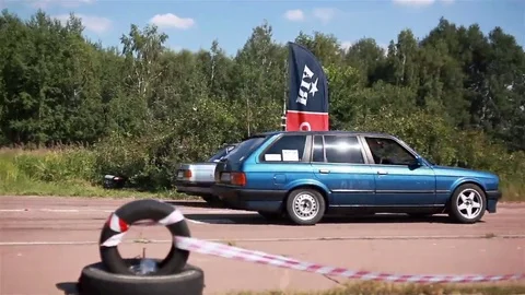 Two BMW e30 at the drag race Stock Footage 69095458