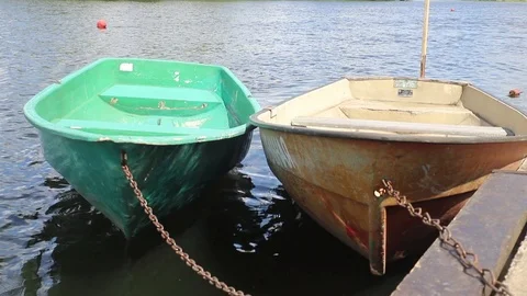 Two boats on a chain at the pier Stock Footage 111918792