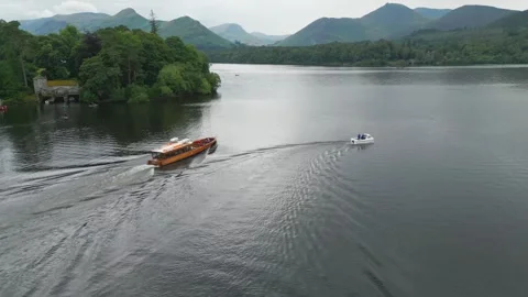 Two boats glide across calm waters Stock Footage 345526721