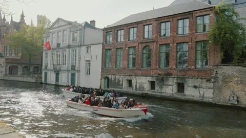 Two boats passed each other in Bruges Stock Footage 307120543