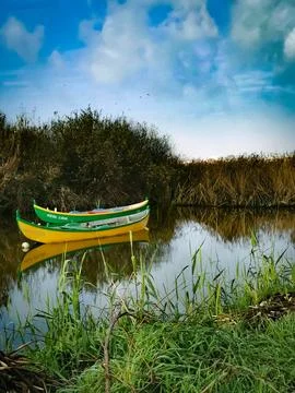 Two boats in the river edited Stockfoto's