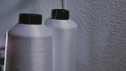 Two bobbin in working sewing machine. White thread Video stock 69077436