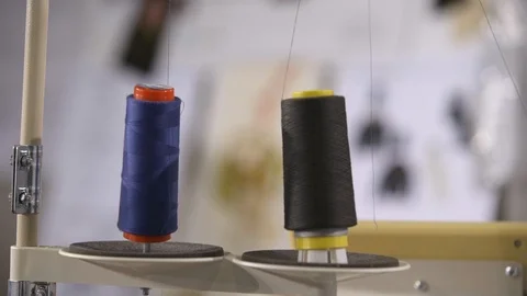 Two Bobbin In Working Sewing Machine. Black and Midnight Blue Stock Footage 99035417