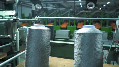 Two bobbins with nylon thread, polyamide used for the manufacture of knitted Stock Footage 104206995