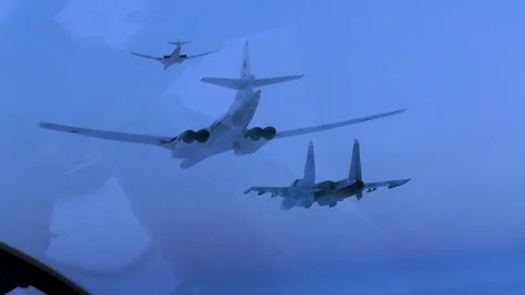 Two bombers and a fighter Stock Footage 100283171