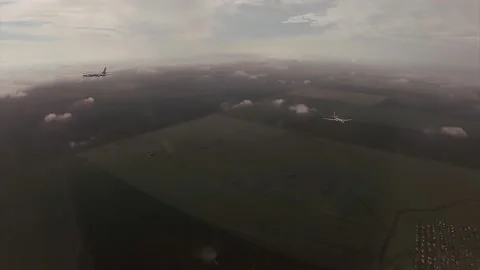 Two bombers fly above the clouds Stock Footage 130343063