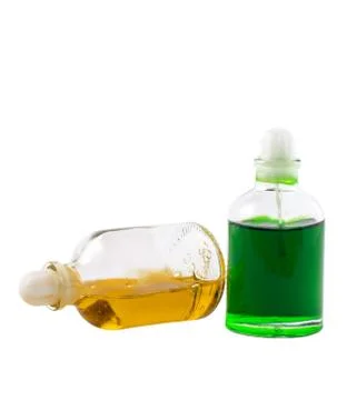 Two bottles with aromatic oils Stock Photos