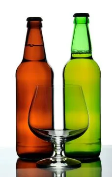 Two bottles of beer and glass, isolated Stock Photos