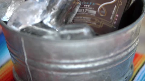 Two bottles of craft beer in an ice bucket Stock-Footage 149366021