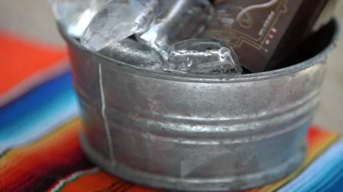Two bottles of craft beer in an ice bucket Stock-Footage 149366591