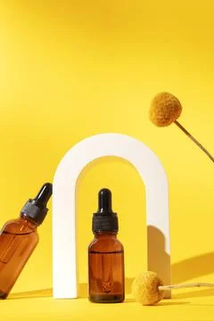 Two bottles different size with serum Stock Photos