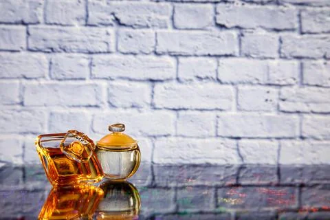 Two bottles of perfume on the table Stock Photos