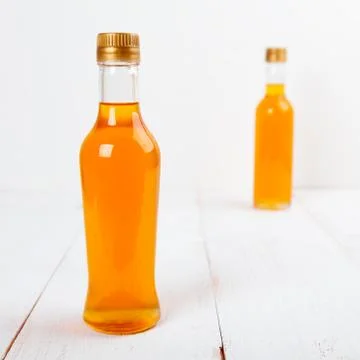 Two Bottles Of Syrup Stock Photos