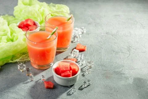 Two bottles of watermelon juice Stock Photos