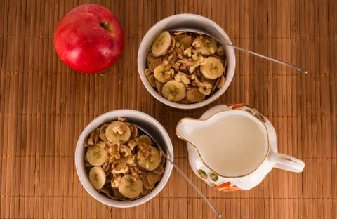 Two bowls of cereal and milk Stock Photos