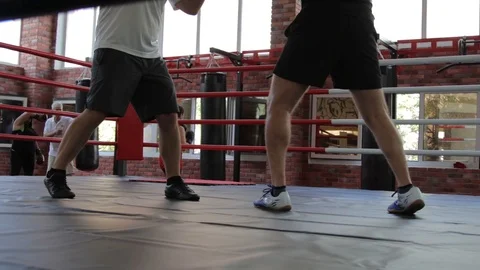 Two box fighter moving in ring Stock Footage 114973285