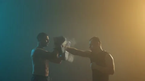 Two Boxers Are Training. One Man Punches Another. Stock-Footage 160764597