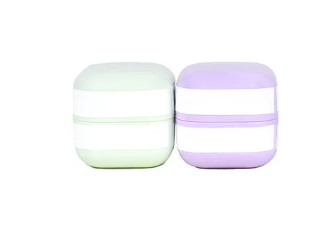 Two boxes for cream isolated Stock Photos