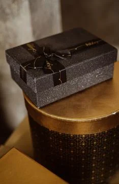 Two boxes. rectangular stands on a round one Stock-Fotos