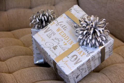 Two boxes in a silver gift box with a silver bow for the wedding Foto stock